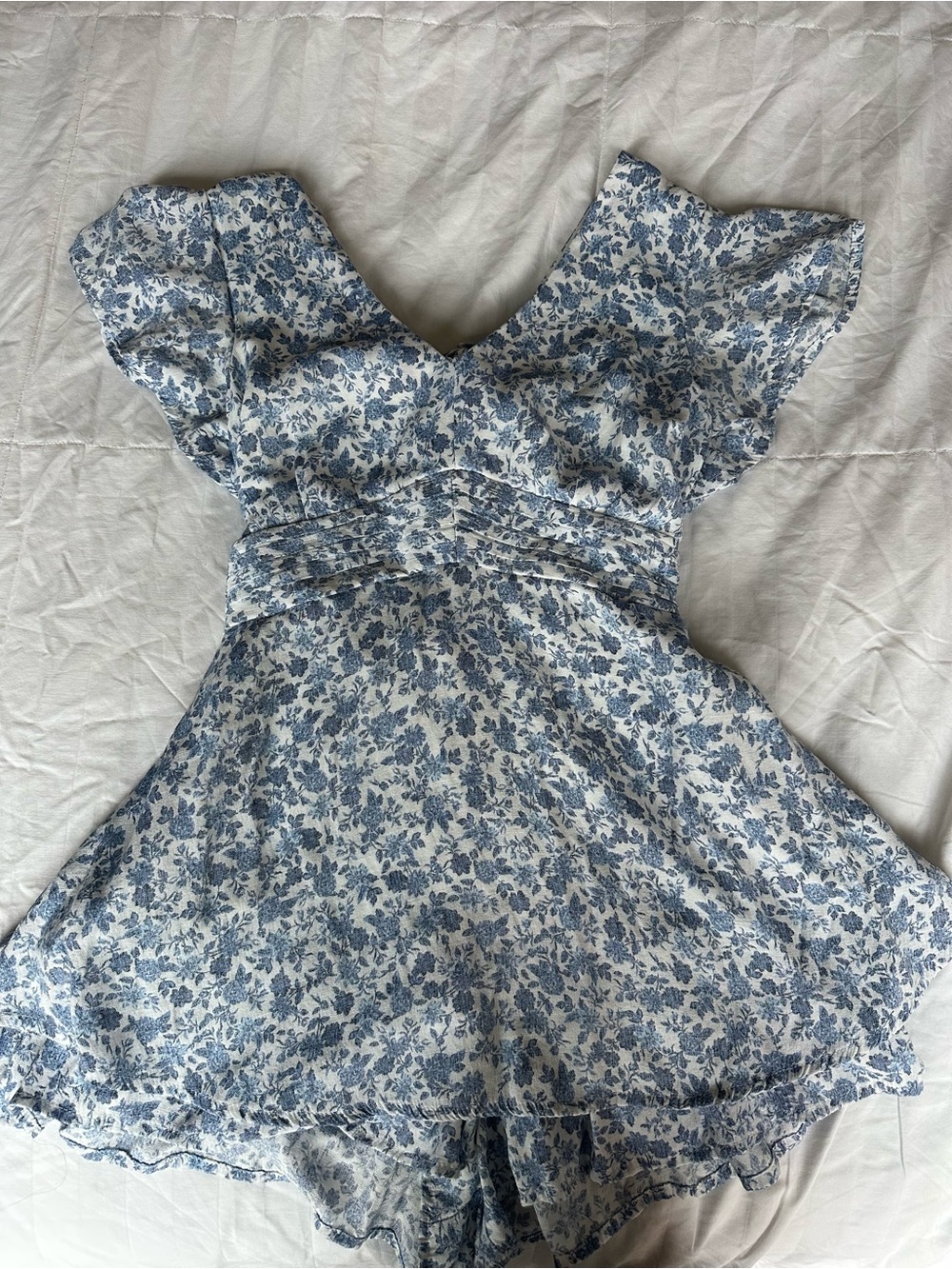 Blue Rain x Francesca’s Blue Floral Ruffle Mini romper fits like a Dress